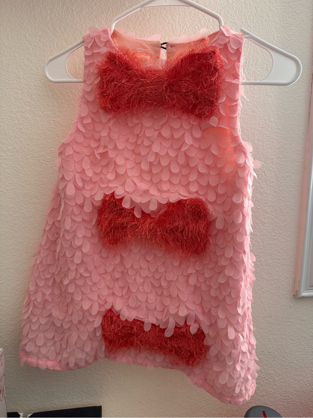 Girls Pink Textured Party Dress with Red Bow Accents